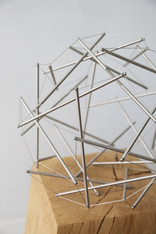 Buckminster Fuller Geodesic Tensegrity sculpture on an Danish oak stool